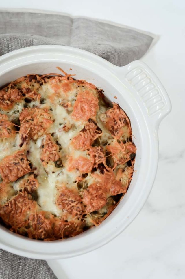 This Savory Prosciutto, Sage and Gruyere Bread Pudding is perfect as a side dish but also filling enough to be the main event. It's the perfect recipe to entertain a crowd!