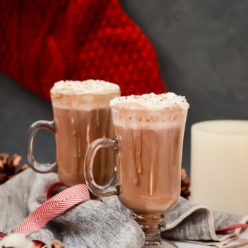 This Spiked Almond Milk Eggnog Hot Chocolate is the perfect holiday drink - much lighter than regular eggnog, kicked up a notch with chocolate and rum!