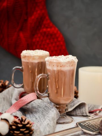 This Spiked Almond Milk Eggnog Hot Chocolate is the perfect holiday drink - much lighter than regular eggnog, kicked up a notch with chocolate and rum!