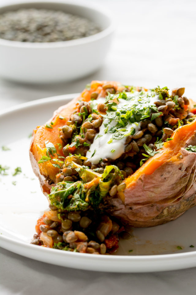 Stuffed Sweet Potatoes with Lentils, Kale and Sun Dried Tomatoes | 21 Recipes to Get Hygge With on CaliGirlCooking.com