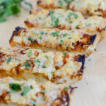 A close-up shot of easy, five-ingredient Cheesy BBQ Garlic Bread.
