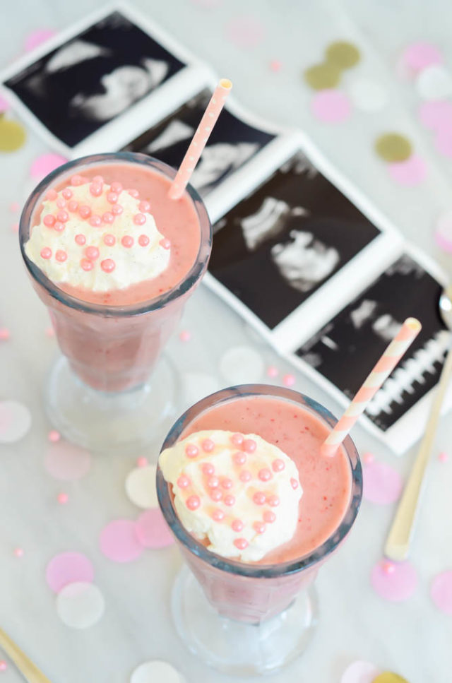 Overhead view of Lightened Up Double Strawberry Milkshakes with some pictures from one of our baby girls' latest ultrasounds!