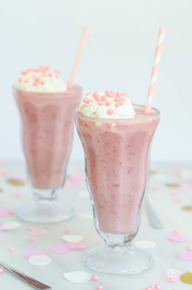 Two frosty Lightened Up Double Strawberry Milkshakes ready to be consumed!