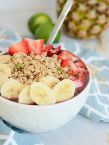 A close-up look at a delicious Hidden Veggie Acai Bowl from CaliGirl Cooking. The perfect healthy breakfast even the pickiest of eaters will love!