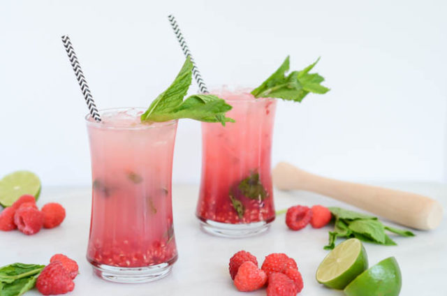 Fresh Raspberry Mint Limeade is the perfect summer quencher. Add vodka to make it a cocktail!