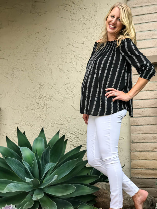 Black geometric off-the-shoulder top from a:glow for Kohl's, white jeans from Old Navy.