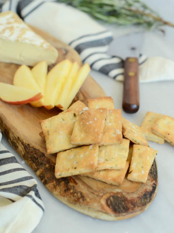 These Homemade Rosemary and Olive Oil Crackers are the perfect accompaniment to your next cheese and charcuterie board!