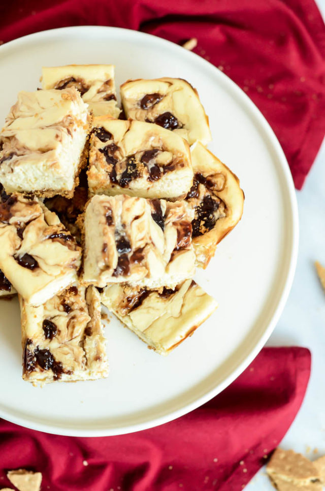 These Peanut Butter and Jelly Cheesecake Bars are the perfect back-to-school treat for your little ones!