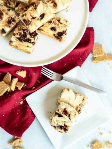 Peanut Butter and Jelly Cheesecake Bars are the perfect way to kick off fall and back to school.