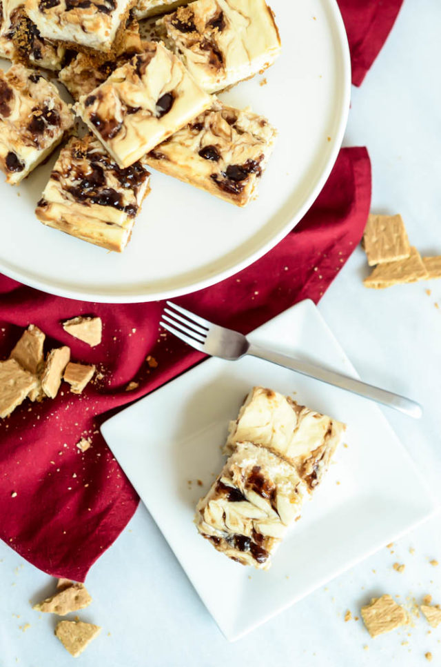 Peanut Butter and Jelly Cheesecake Bars are the perfect way to kick off fall and back to school.