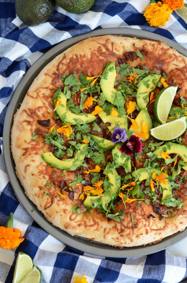 Avocado Pizza with Bacon, Lime and Cilantro is a fun new pizza flavor that is sure to impress.
