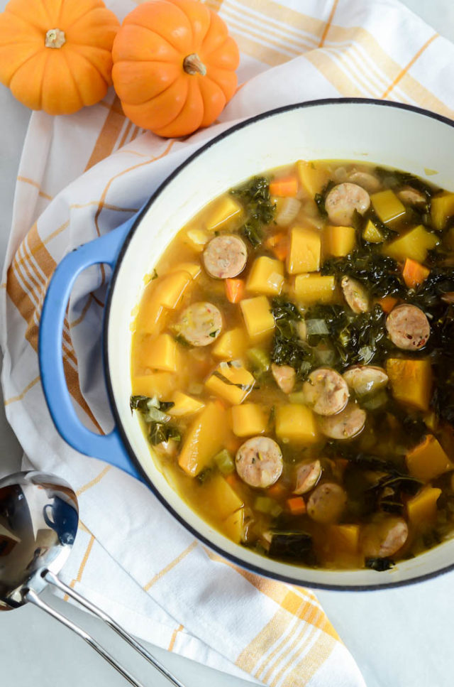 A big pot of Butternut Squash and Sausage "Stoup" with Crispy Brussels Sprouts is the perfect dinner to have linger on the stove on any busy night.