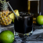 A Midnight Mai Tai is the perfect spooky cocktail to kick off the weekend.
