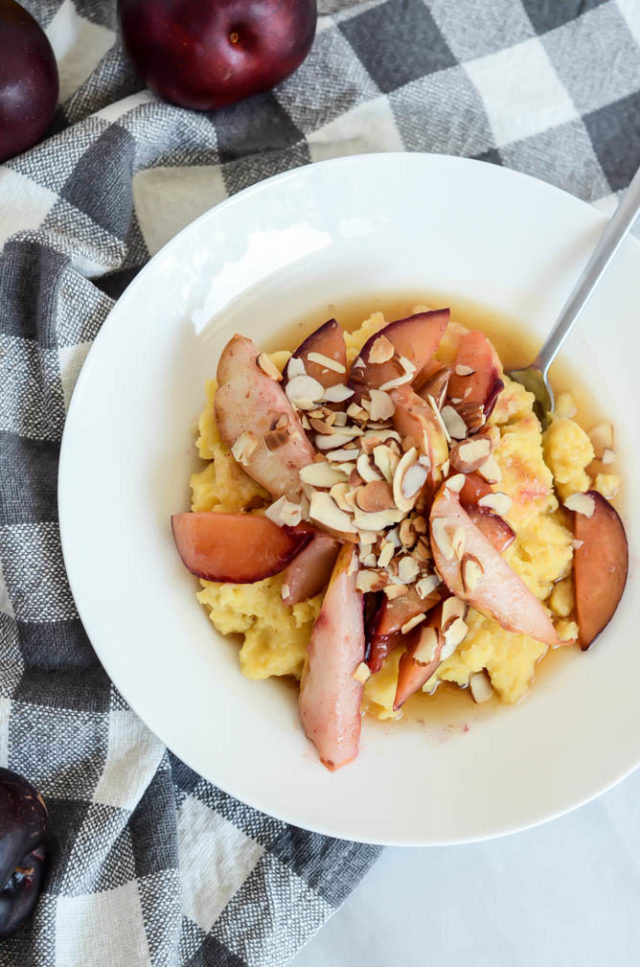 A bowl of Pear and Plum Breakfast Polenta with Maple Syrup is the perfect start to a busy morning.