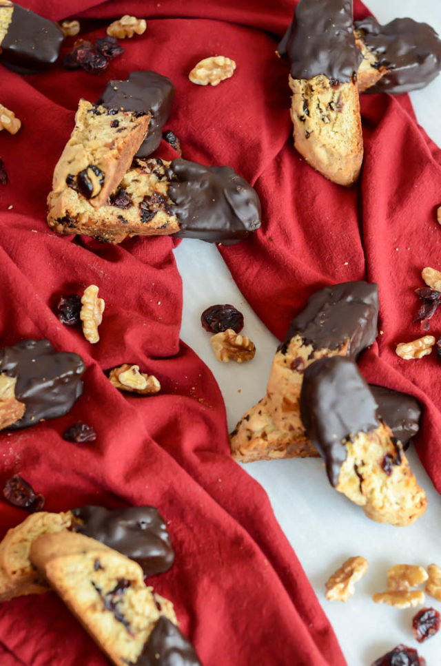 These Chocolate Dipped Cranberry Walnut Biscotti are the perfect holiday cookie to add to your baking repertoire.