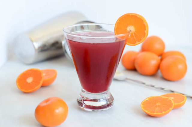 A Festive Cranberry Clementine Martini is easy to make and a real crowd pleaser.