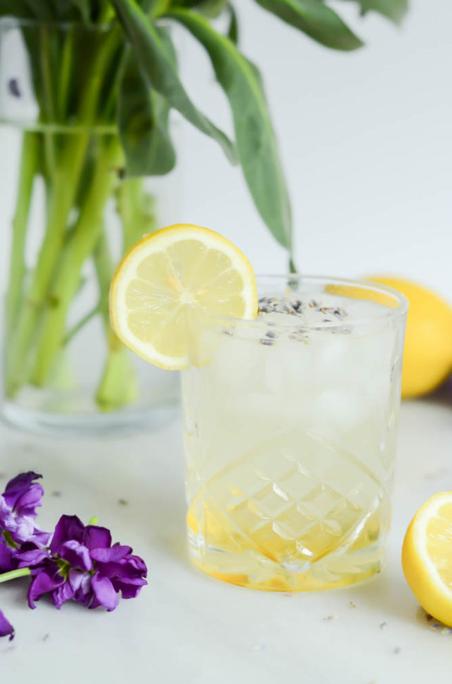 Make a delicious Lavender Collins with just gin, lavender simple syrup, fresh lemon juice and club soda!