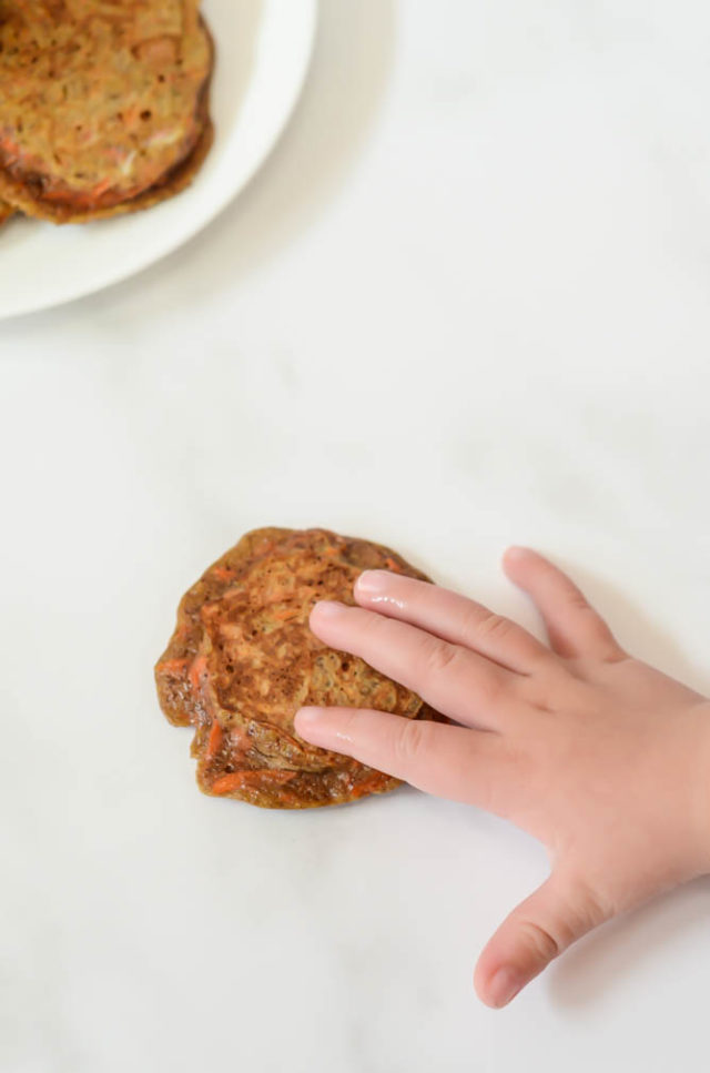 You won't be able to keep little hands off of these baby-friendly Healthy Carrot Cake Pancakes!