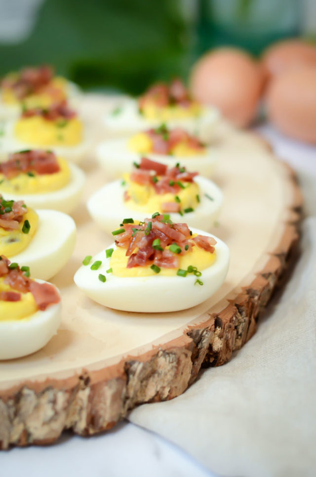 These Candied Bacon Deviled Eggs are the perfect appetizer for your next brunch or Easter get-together. | CaliGirlCooking.com