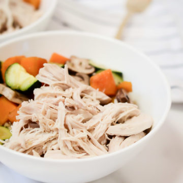 The Easiest Instant Pot Shredded Chicken is perfect when combined with some whole grains and roasted vegetables in a bowl for a healthy meal.