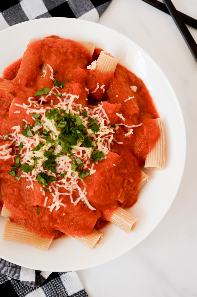 A bowl of penne pasta topped with Hidden Veggie Pasta Sauce.