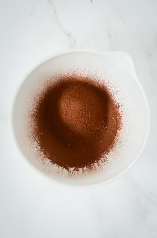A mixing bowl of cocoa powder, flour and salt.