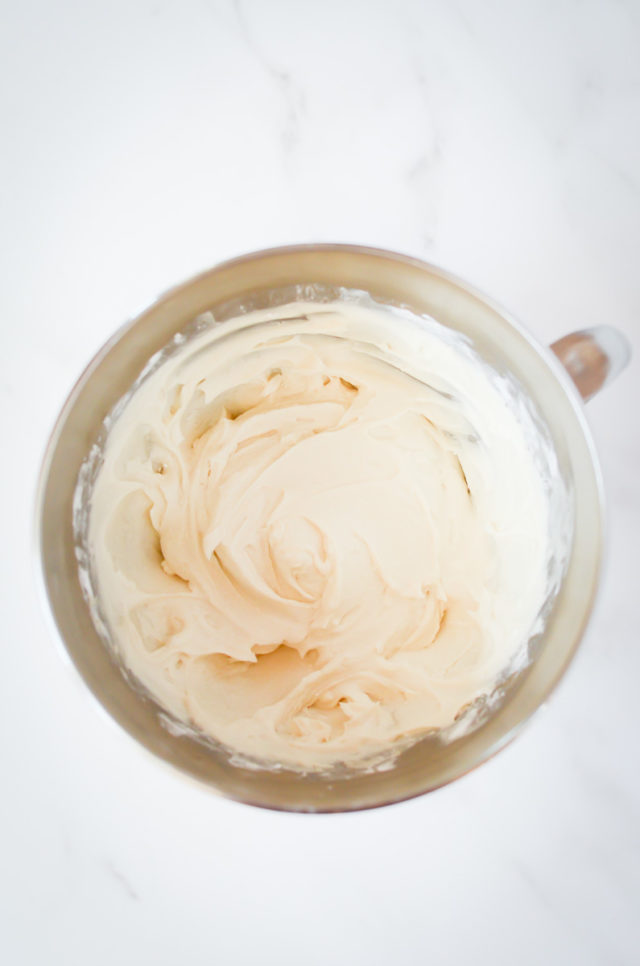 Vanilla buttercream frosting in a mixing bowl.