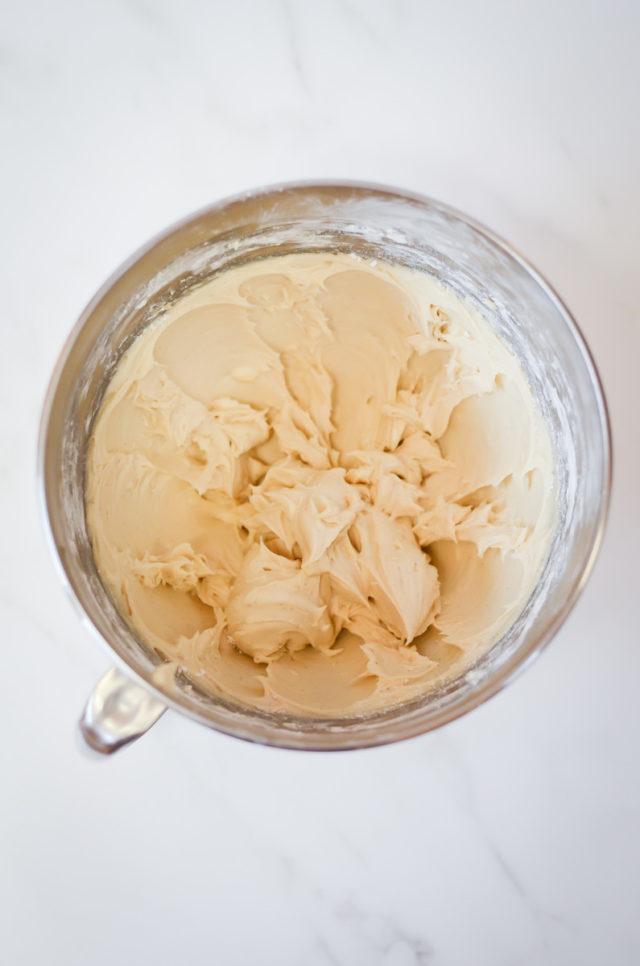 A mixing bowl of Irish cream buttercream.